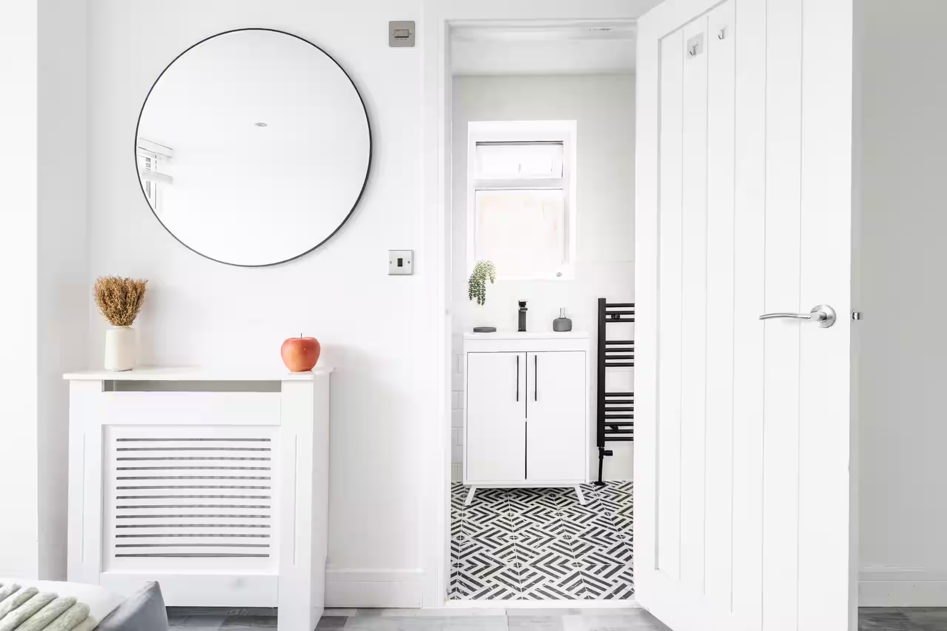 Bedroom with round mirror